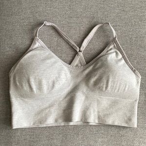 Light grey adjustable sports bra with removable pads